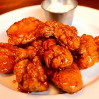 Boneless Wings · Choice of Buffalo, BBQ, Sweet Chili or Nashville Hot sauce. Blue cheese or ranch dipping sau...