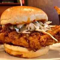 Crispy Chicken Sandwich · Buttermilk battered chicken breast, Nashville hot sauce, coleslaw