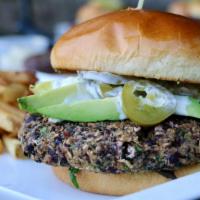Veggie Burger · Spinach, quinoa, black bean patty, topped with avocado, pickled jalapeños, ranch dressing, s...
