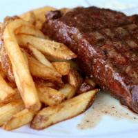 Steak Frites · Flat iron steak, garlic butter, hand-cut fries