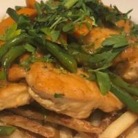 Chicken Curry · Sautéed chicken tenders, carrots, green beans, curry sauce, over skin-on French fries