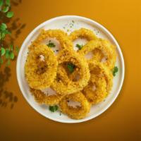 On My Onion Rings · Sliced onions dipped in a light batter and fried until crispy and golden brown. Served with ...