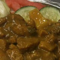 Curry Chicken · Served with rice or vegetables.