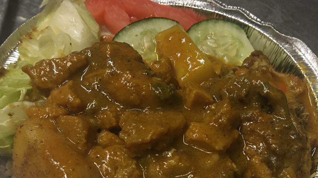 Curry Chicken · Served with rice or vegetables.