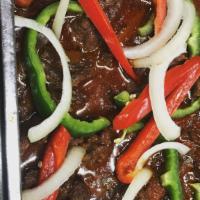 Pepper Steak · Green pepper, onion with speciality  sauce