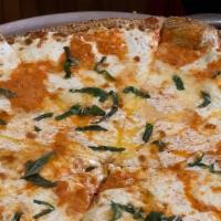 Drunken Margherita Pizza · Traditional margherita round style pizza with sliced fresh mozzarella and our
homemade vodka...