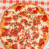 Margherita · Traditional Neapolitan style pizza topped with sliced fresh mozzarella, shredded mozzarella,...