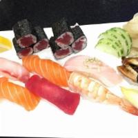 Sushi Deluxe · Nine pieces sushi and tuna roll or California roll.
