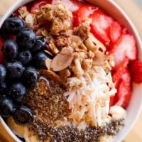 Acai Bowl · Acai Puree, Oat, Granola, Almond Milk, Strawberries, Banana, Kiwi, Blueberries, Flaxseed, Ch...