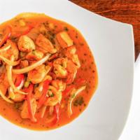 Seafood Stew · Containing calamari, mussels, scallops, clams, shrimps, salmon in a lobster brandy sauce.