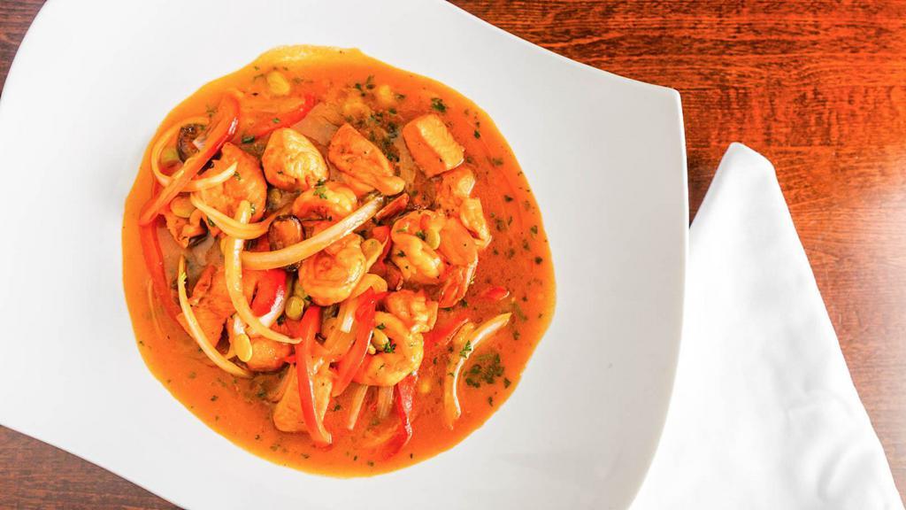 Seafood Stew · Containing calamari, mussels, scallops, clams, shrimps, salmon in a lobster brandy sauce.