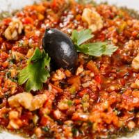 Ezme · Finely chopped tomatoes, peppers, onions,hot spices, olive oil.