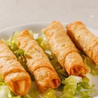 Cheese Roll · Fried phyllo dough stuffed with feta cheese and parsley.