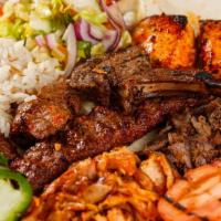 Mixed Grill · Combination of lamb adana, shish kebab, gyro, lamb chops grilled to your taste.