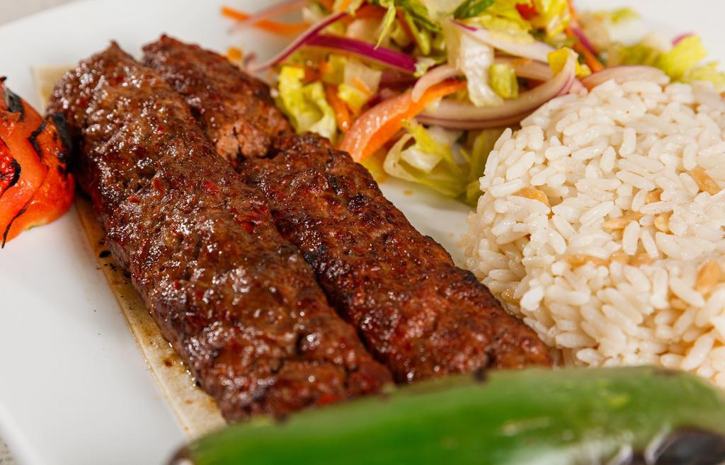 Lamb Adana · Hand chopped meat seasoned with spice and red pepper.
