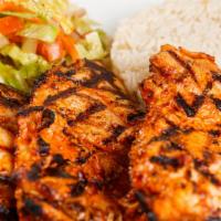 Chicken Chops · Marinated chicken thighs, with the bone, grilled your taste.