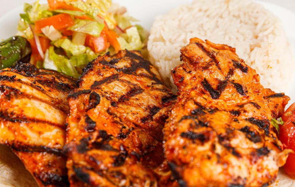 Chicken Chops · Marinated chicken thighs, with the bone, grilled your taste.
