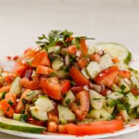 Shepherd Salad · Fresh tomatoes, cucumbers, onions, green peppers, parsley and dressing.