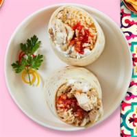 Chicken Burrito · Grilled chicken topped with sour cream, salsa, cheese, and spanish rice wrapped in a warm to...