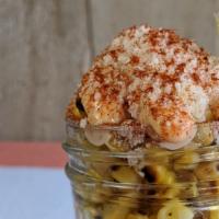 Corn Esquites · Roasted corn, chopotle mayo, queso cotija, lime, pequin.