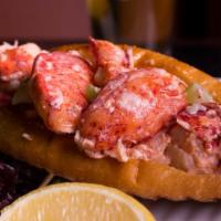 Chilled Lobster Roll · Fresh Maine lobster chunks, tangy dressing, diced celery, onions, grilled New England style ...