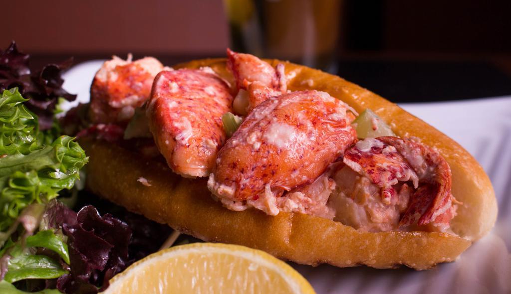 Chilled Lobster Roll · Fresh Maine lobster chunks, tangy dressing, diced celery, onions, grilled New England style bun.