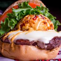 Ultimate Tailgate · Signature item. Jumbo lump crab cake on a seared burger, American cheese, lettuce, tomato, o...