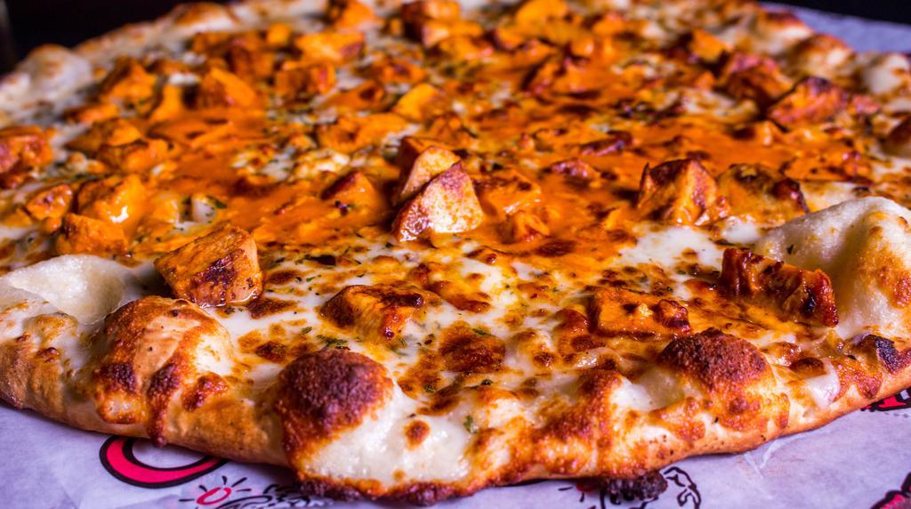 Buffalo Chicken · Buffalo chicken, our white pie, crumbled blue cheese.