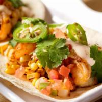 Shrimp Tacos · Shrimp, pico de gallo, roasted corn,
cilantro, jalapeños, chipotle
lime crema