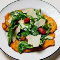 Milanese · Traditional chicken milanese, arugula, cherry tomatoes, shaved parmigiano and balsamic reduc...