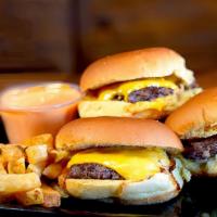 3 Sliders Combo · Each combo comes with rice or fries and a drink.