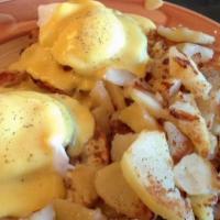 Eggs Benedict · Two Poached Eggs with Canadian Bacon, served over Toasted Thomas
English Muffin, topped with...
