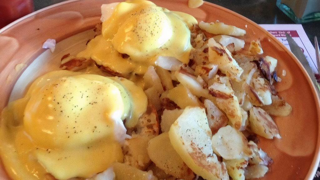 Eggs Benedict · Two Poached Eggs with Canadian Bacon, served over Toasted Thomas
English Muffin, topped with Hollandaise Sauce, served with Home Fries