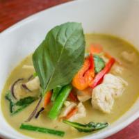 Green Curry · Bamboo shoot, basil, bell pepper, long hot chili, eggplant and coconut milk. Spicy.