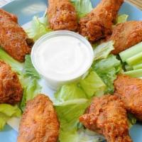 Buffalo Wings · Choice of hot, mild, honey BBQ or teriyaki sauce. Served with celery and blue cheese.