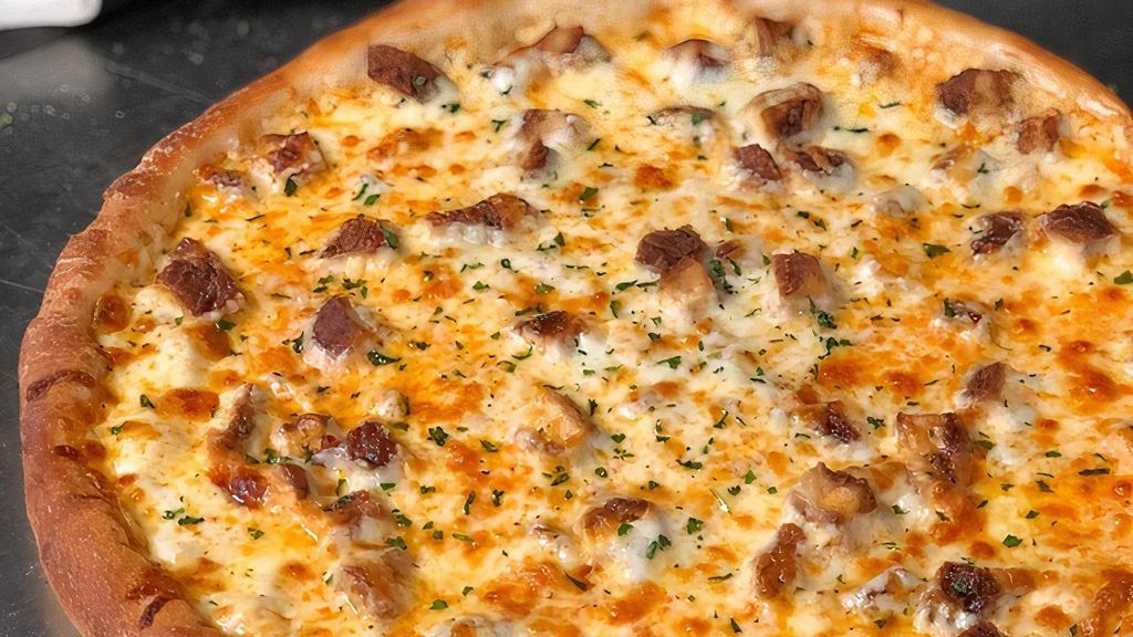 Buffalo Chicken Wing Pizza · Our Buffalo Sauce base with fried or marinated chicken, mozzarella topped with blue cheese drizzle