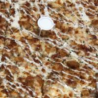 Chicken Bacon Ranch Pizza · Garlic base with either fried or grilled chicken, bacon, mozzarella topped with a drizzle of...
