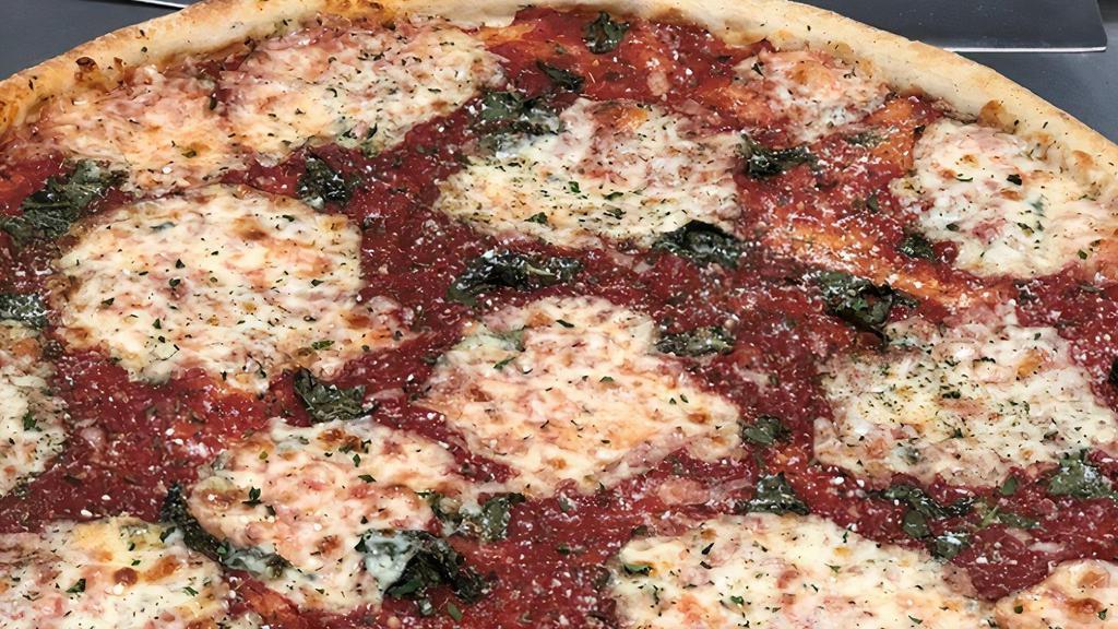 Margherita Pizza · House red sauce with fresh basil and fresh mozzarella
