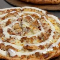 Loaded Fry Pizza · Sour cream, crispy fries, hardwood smoked bacon, mozzarella and cheddar.