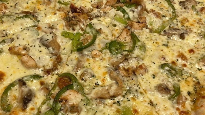 Chicken Philly Pizza · garlic sauce, marinated grilled chicken, onion, green pepper, mushroom and mozzarella.