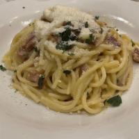 Spaghetti Carbonara · pancetta, egg yolk, cream salt and pepper