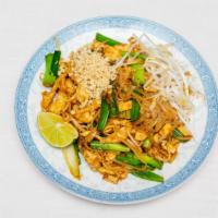 Pad Thai · Stir-fried thai noodles with baby shrimp, egg, bean sprouts, dry tofu, and topped with groun...