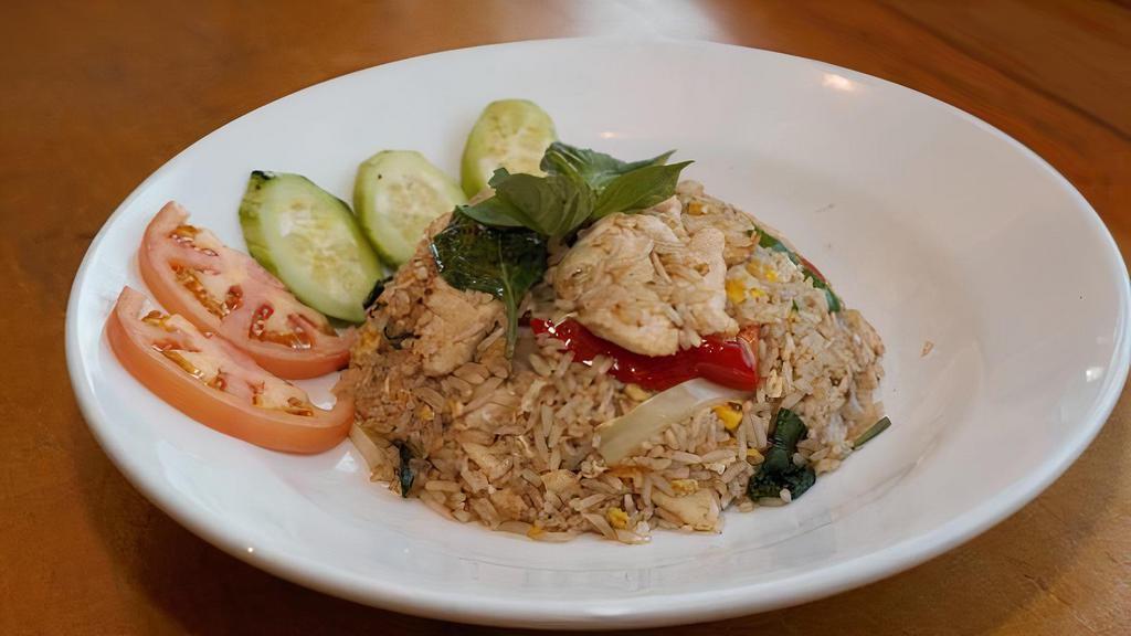 Basil Fried Rice · Spicy. Fried rice with fresh basil, onion, bell pepper, and egg in spicy chili basil sauce.  Add chicken, tofu, vegetable, beef, shrimp, seafood for an additional charge.
