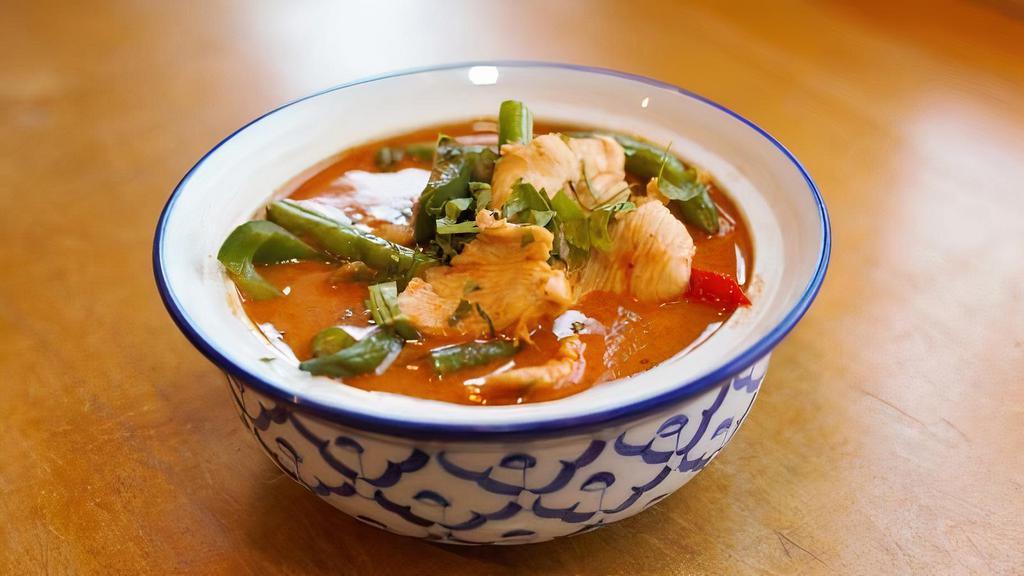 Panang Curry · Spicy. Red curry with string beans and bell peppers . Add chicken, tofu, vegetable, beef, shrimp for an additional charge.