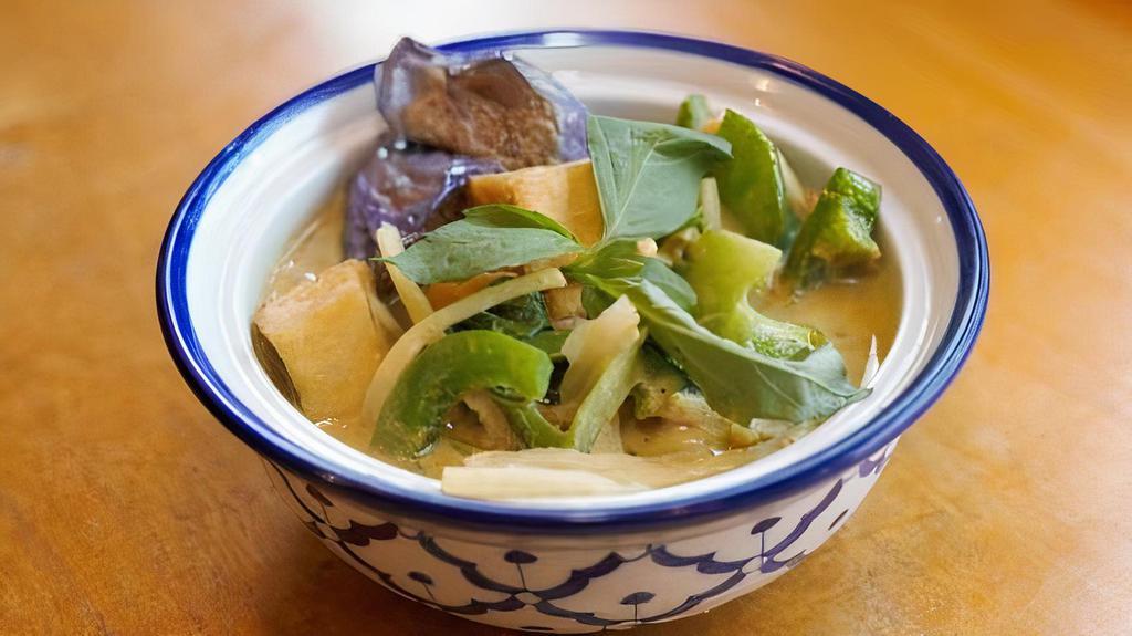 Green Curry · Spicy. Bell peppers, eggplant, bamboo shoot, string bean , basil leaves and coconut milk. Add chicken, tofu, vegetable, beef, shrimp for an additional charge.