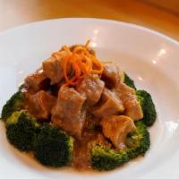 Vegan Crispy Tofu Rama · Vegan. Steamed broccoli, carrot, and tofu with peanut sauce served with jasmine rice.