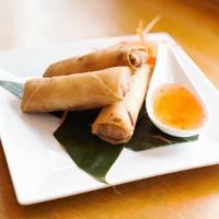 Crispy Vegetable Spring Roll · Vegetarian. Stuffed with glass vermicelli, carrot, and cabbage served with sweet plum chili ...
