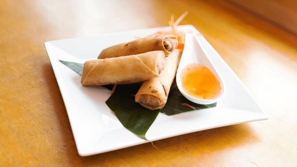 Crispy Vegetable Spring Roll · Vegetarian. Stuffed with glass vermicelli, carrot, and cabbage served with sweet plum chili sauce.