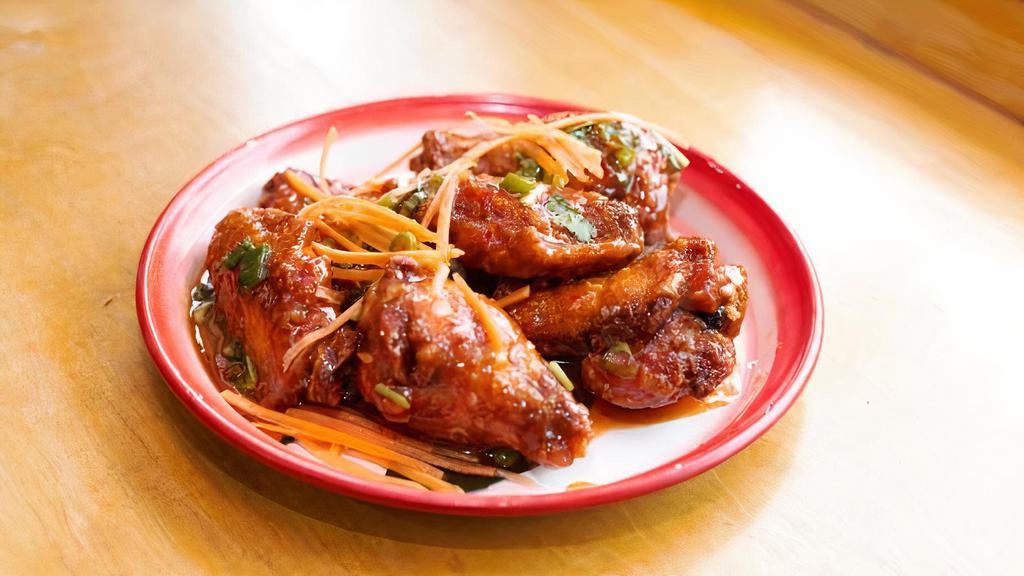 Sriracha Wings · Spicy. Deep-fried chicken wings coated with house sriracha sauce.