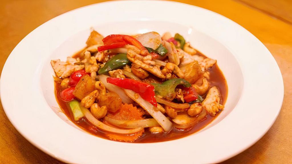 Wok Cashew Nut · Spicy. Stir-fried with bell peppers, pineapple, mushroom, and sweet chili paste. Add chicken, tofu, vegetable, beef, shrimp, seafood for an additional charge.